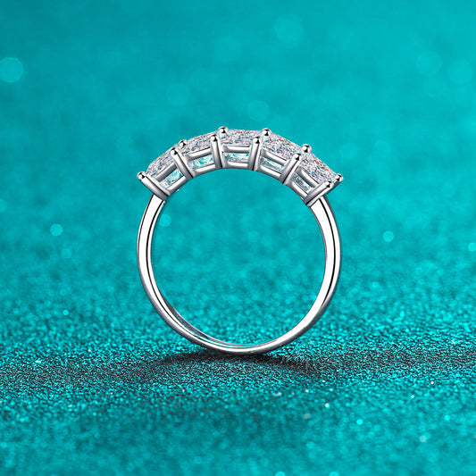 Moissanite stacking ring shown on hand