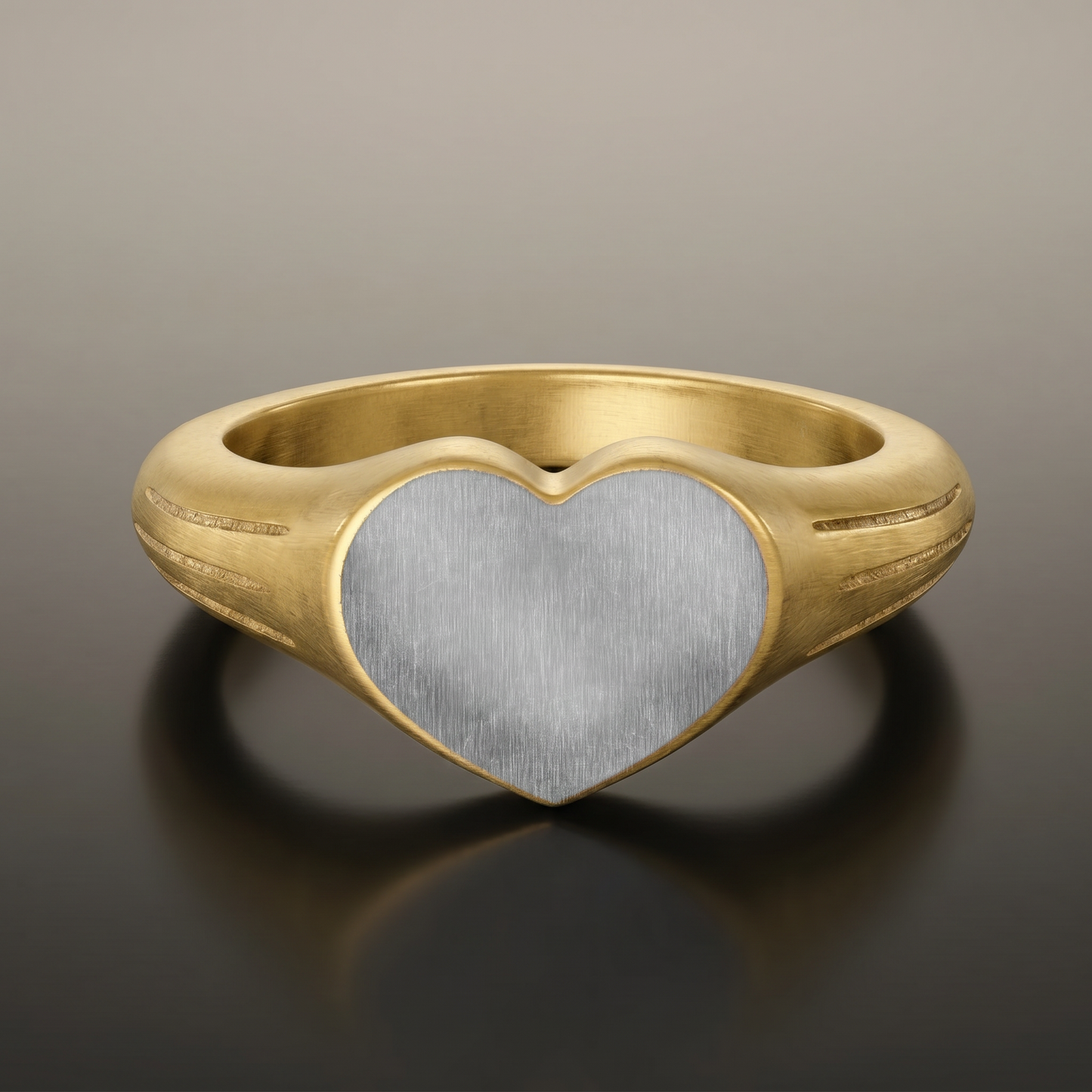 Engraved Heart Signet Ring on premium studio backdrop, high-contrast catalog shot