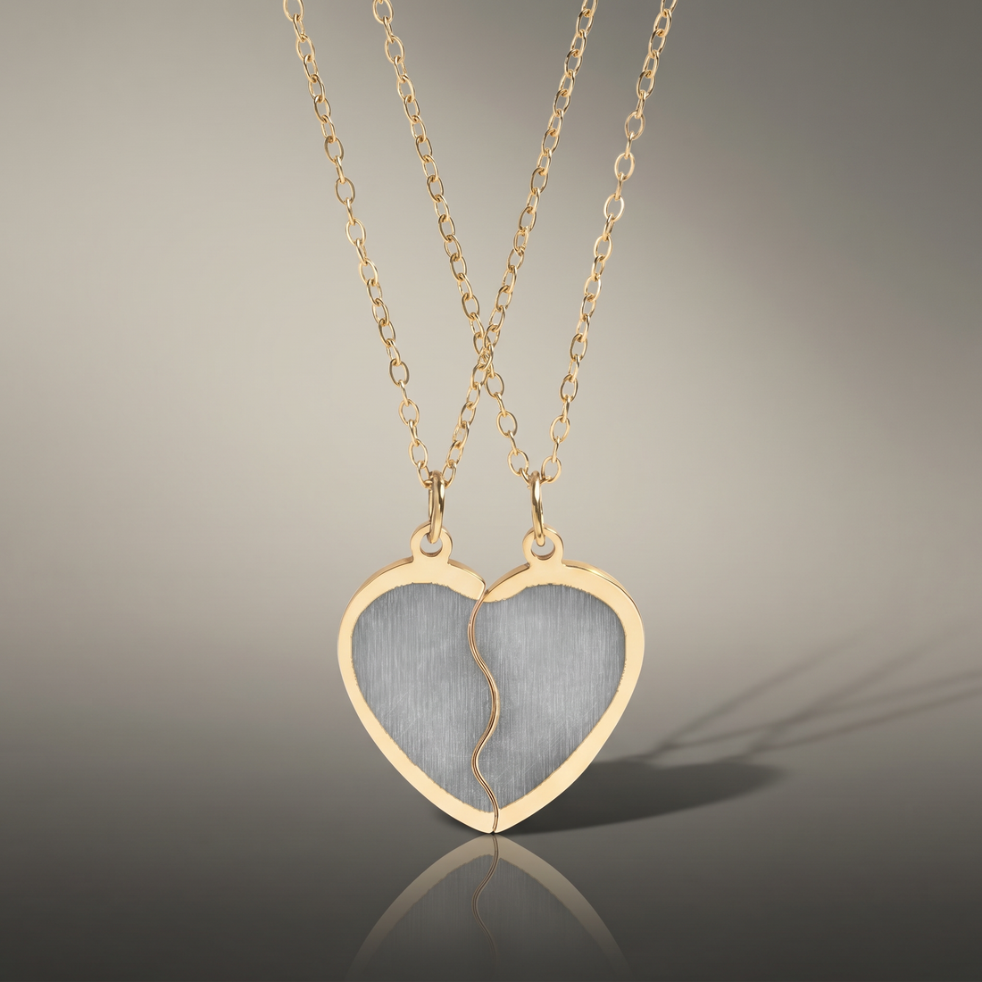 Break Apart Heart Necklace Set from HussainTraders, two interlocking gold heart pendants on delicate chains for couples and long-distance relationships