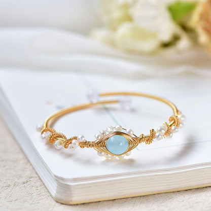 Pearl cuff bracelet on wrist