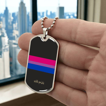 Bi pride stripe dog tag held up by a window | Subtle Bi Pride Dog Tag