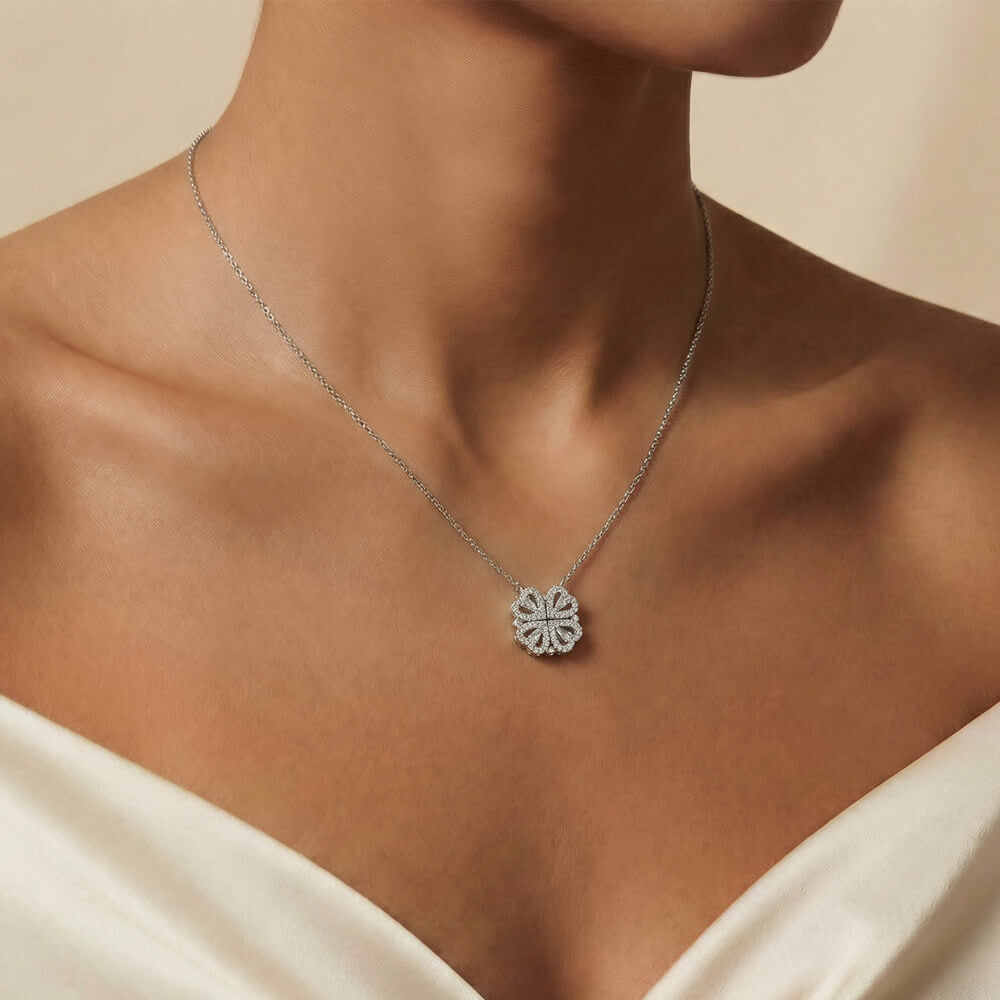 Clover pendant worn at the neckline | Magnetic Hearts Necklace