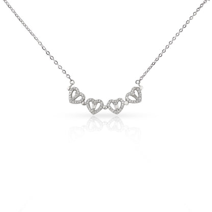 Magnetic hearts pendant opened into a row of four hearts | Magnetic Hearts Necklace