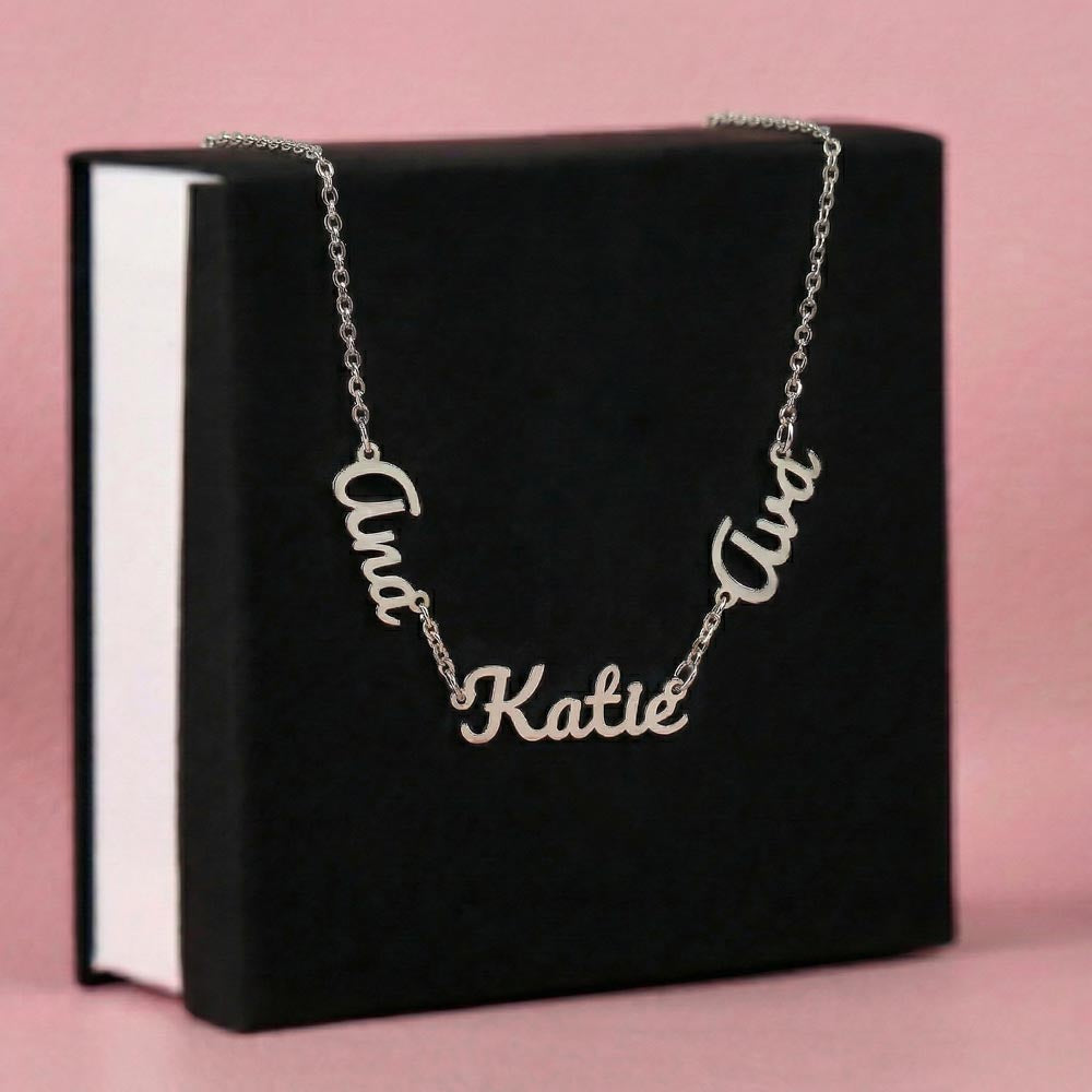 Steel three-name necklace draped over a black gift box | Multiple Name Necklace