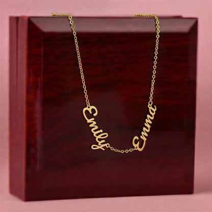 Gold finish two-name necklace draped over the mahogany Luxury Box | Multiple Name Necklace