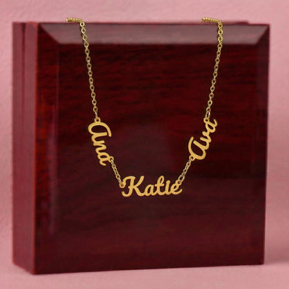 Gold finish three-name necklace draped over the mahogany Luxury Box | Multiple Name Necklace