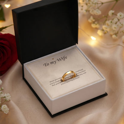 Gold finish ring and To My Wife card in an open gift box with warm lights | Engraved Ring for Wife with Message Card