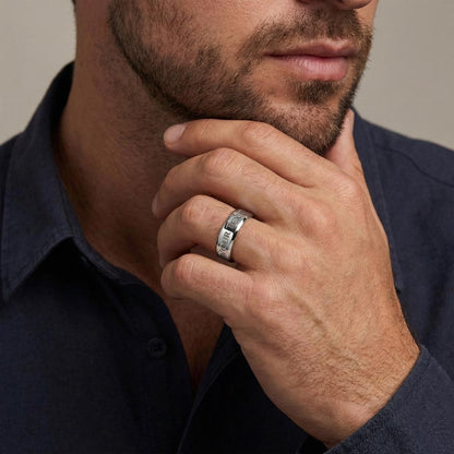 Man wearing the steel ring with his hand at his chin | Engraved Men's Ring