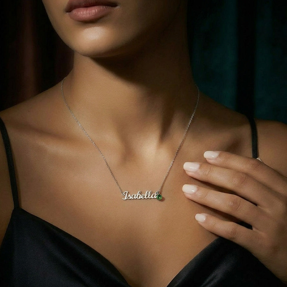 Woman in a black top wearing the steel name necklace with birthstone | Name Necklace with Birthstone