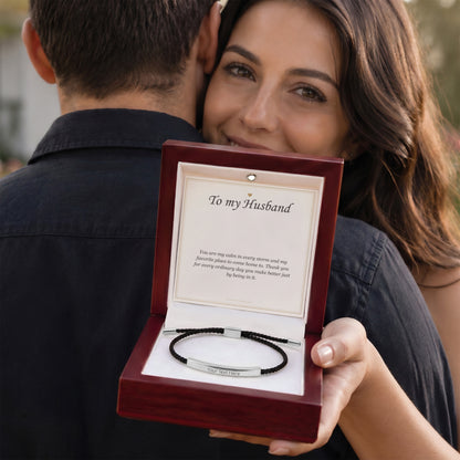 Couple holding the open mahogany Luxury Box with the bracelet and card | Engraved Bracelet for Husband with Message Card