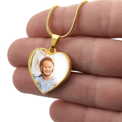 Hand holding the gold finish heart pendant printed with a sample photo | Custom Photo Heart Necklace with Engraving