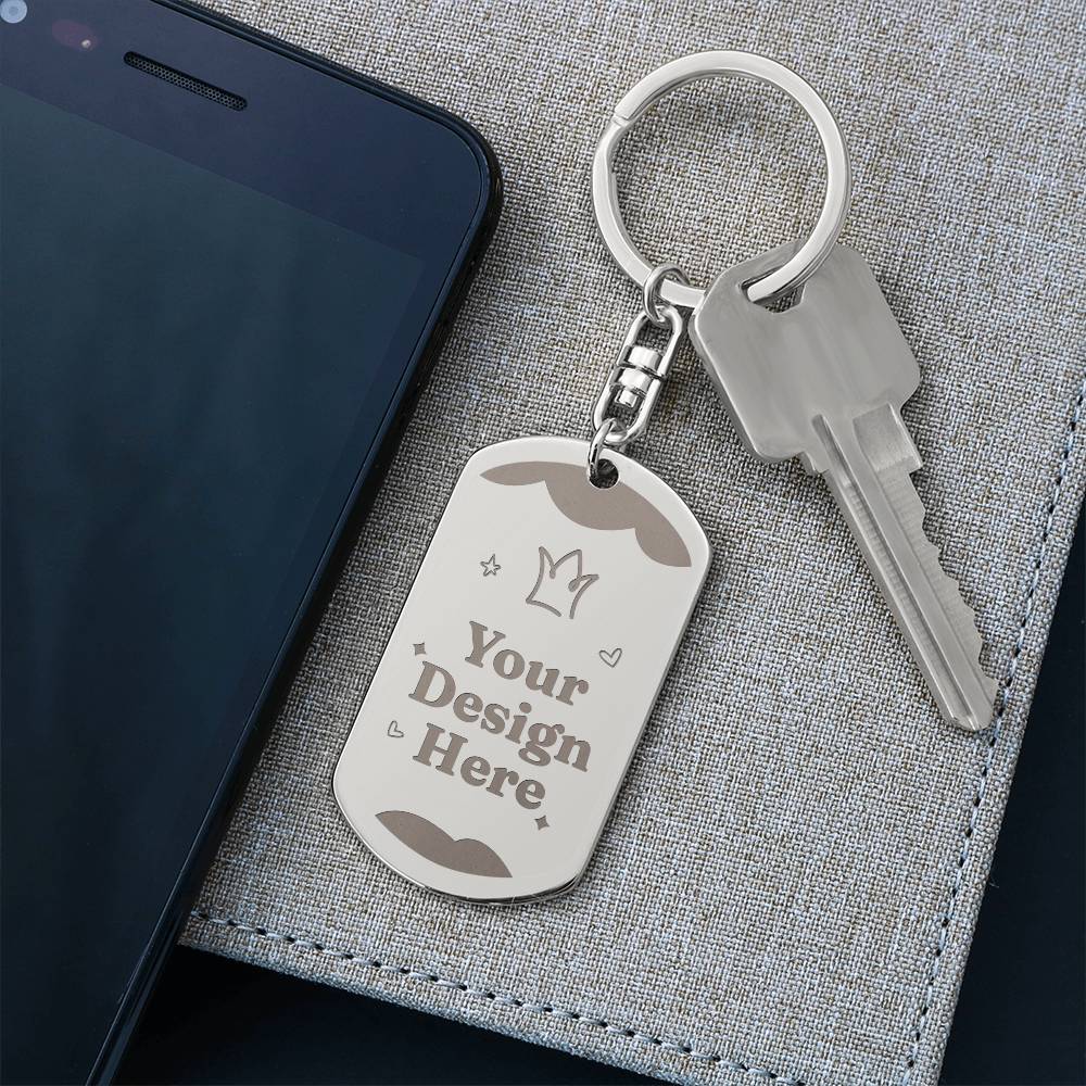 Steel dog tag keychain on a dark notebook | Engraved Dog Tag Keychain