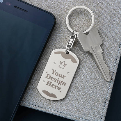 Steel dog tag keychain on a dark notebook | Engraved Dog Tag Keychain