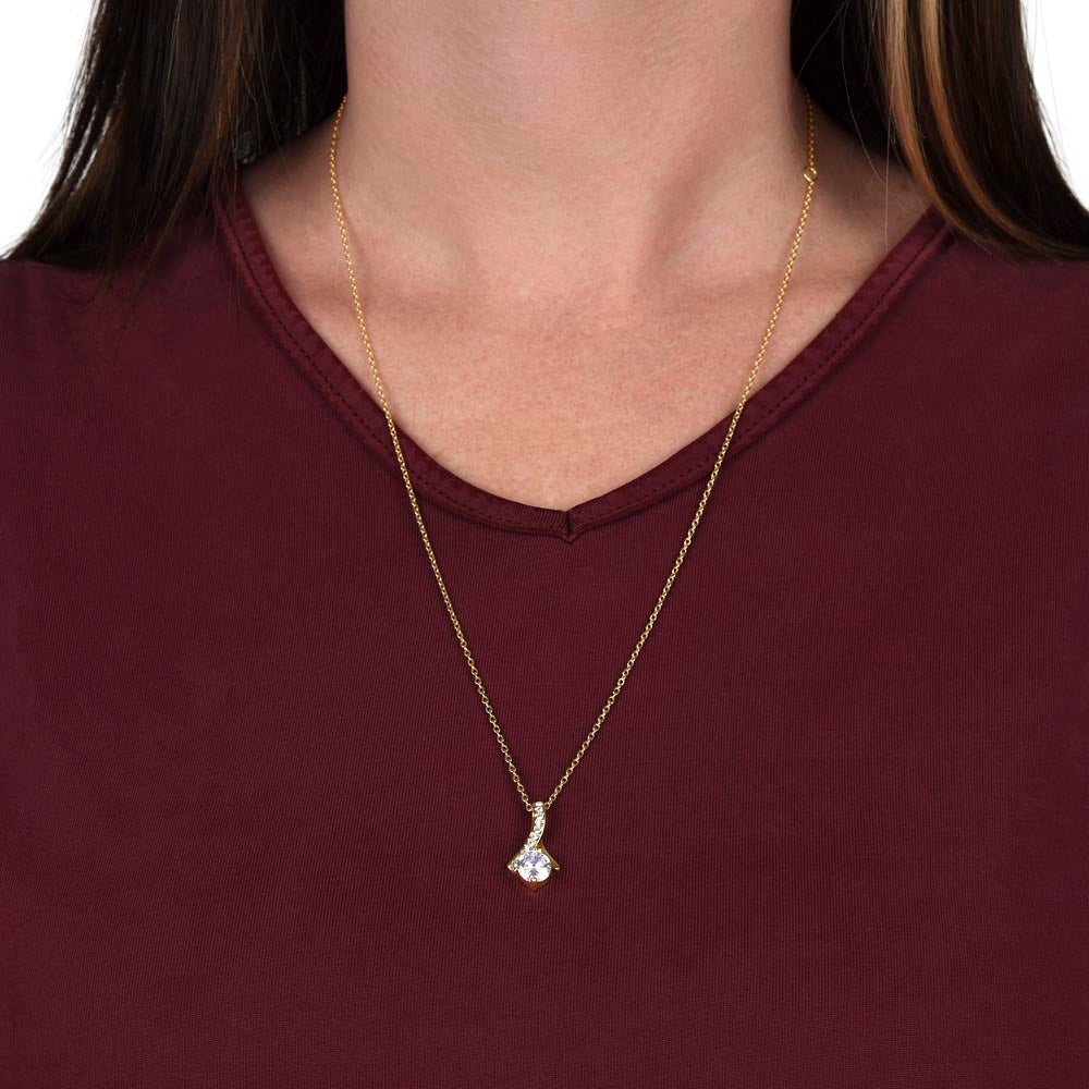 Yellow gold finish pendant worn with a burgundy top | Proud Mom Necklace