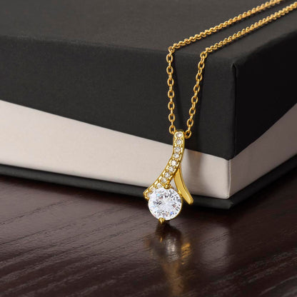 Yellow gold finish pendant draped over a black gift box | Proud Mom Necklace
