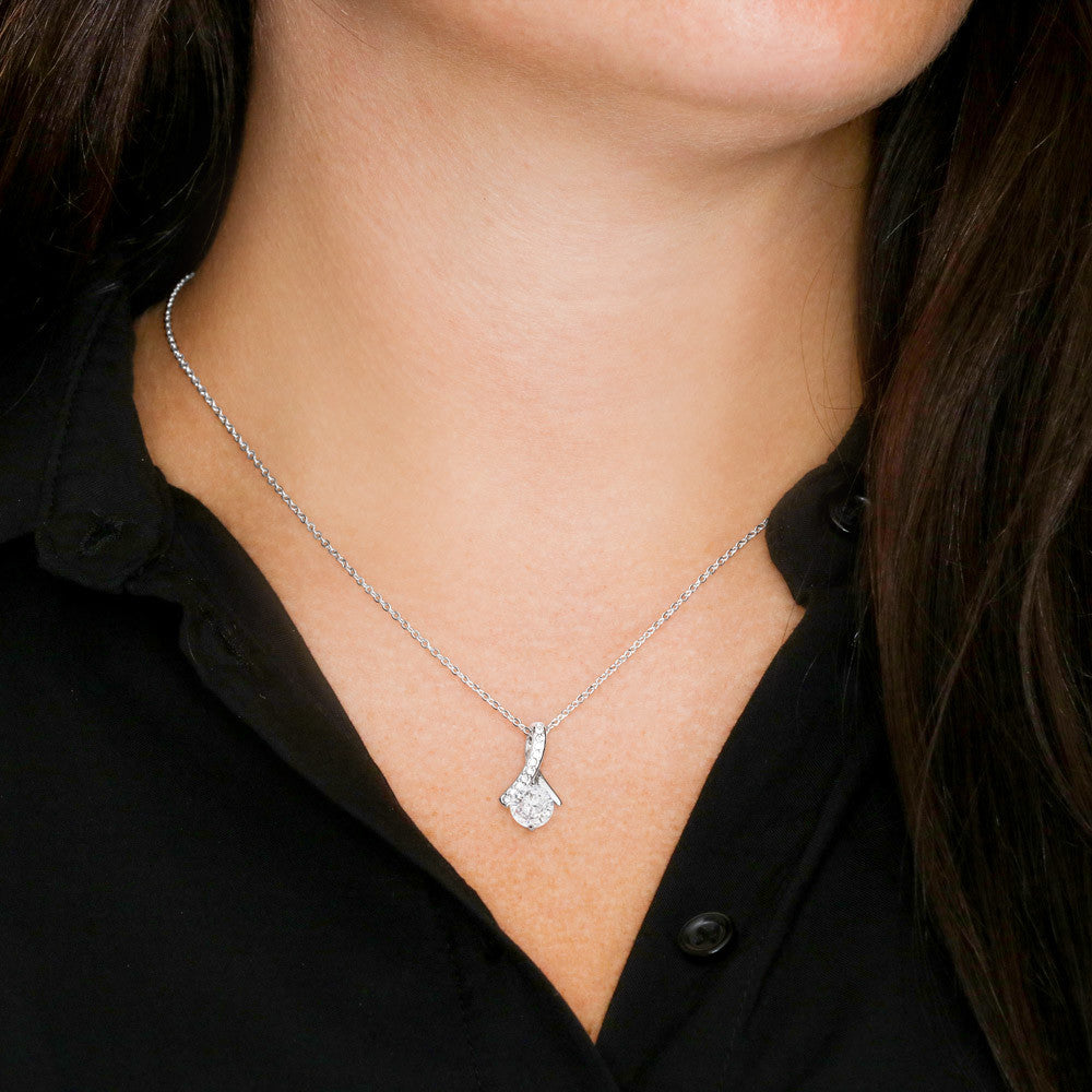 White gold finish pendant worn with a black blouse | Proud Mom Necklace