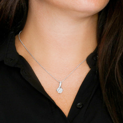 White gold finish pendant worn with a black blouse | Proud Mom Necklace