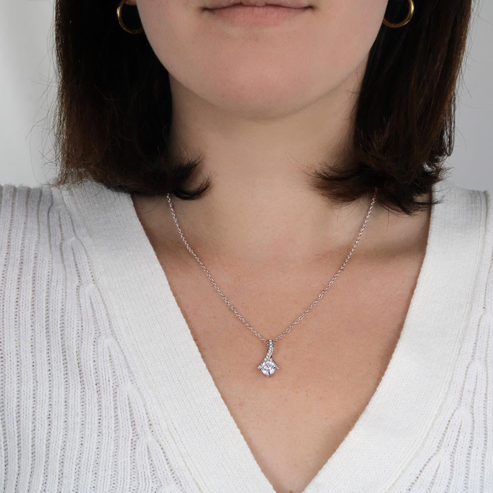 Woman in a white knit top wearing the white gold finish pendant | Proud Mom Necklace