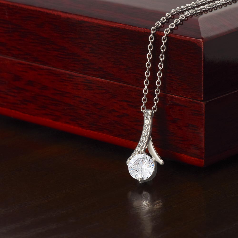 White gold finish pendant draped over the mahogany Luxury Box | Proud Mom Necklace