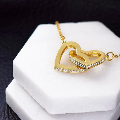 Yellow gold finish interlocking hearts on a white stone block | Always Proud, Always Loved Necklace