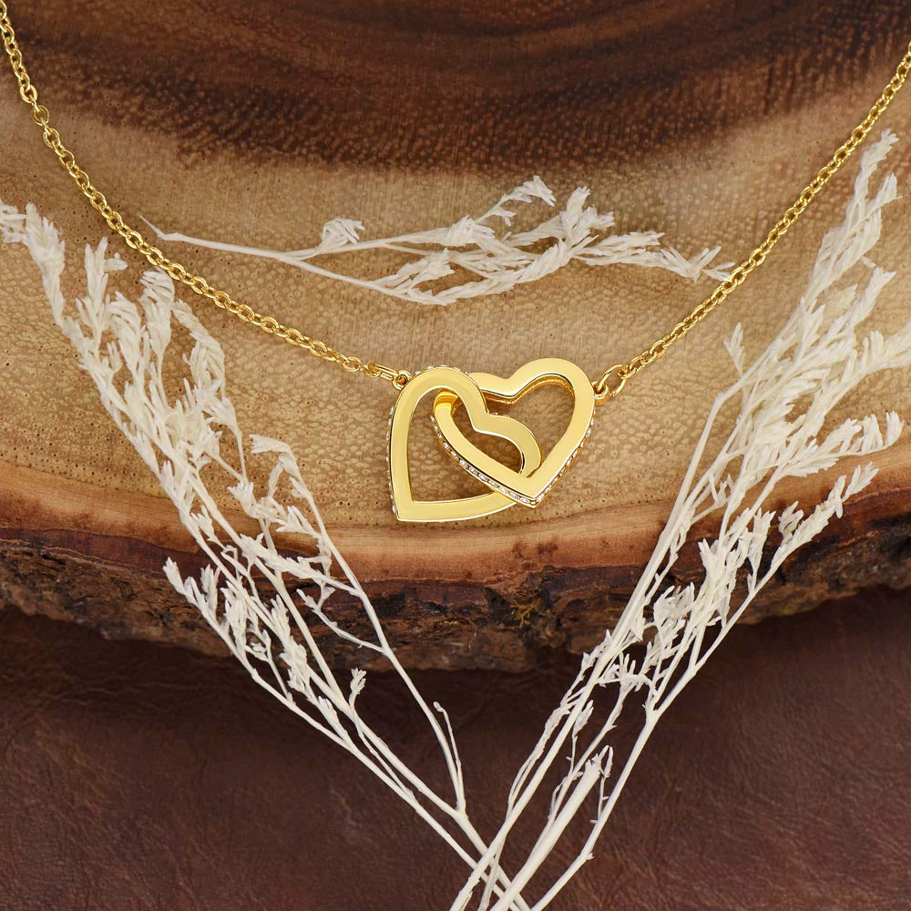 Yellow gold finish hearts on a wood slice with dried flowers | Always Proud, Always Loved Necklace