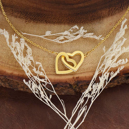 Yellow gold finish hearts on a wood slice with dried flowers | Always Proud, Always Loved Necklace
