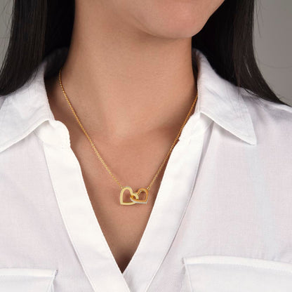 Yellow gold finish hearts pendant worn with a white shirt | Always Proud, Always Loved Necklace