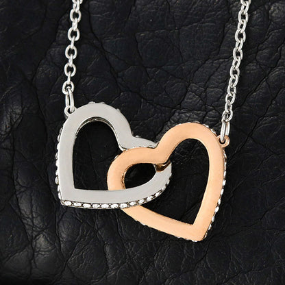 Steel and rose gold interlocking hearts on black leather, close view | Always Proud, Always Loved Necklace