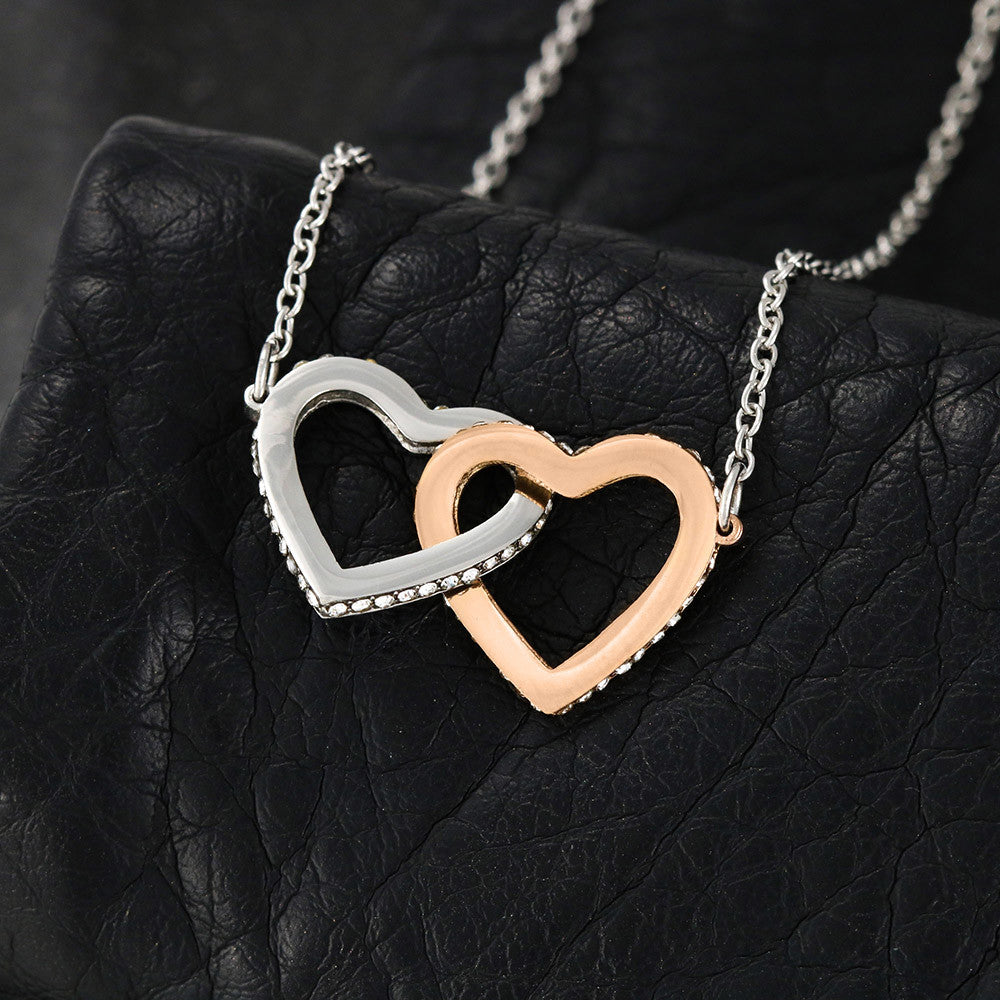 Steel and rose gold interlocking hearts on black leather | Always Proud, Always Loved Necklace