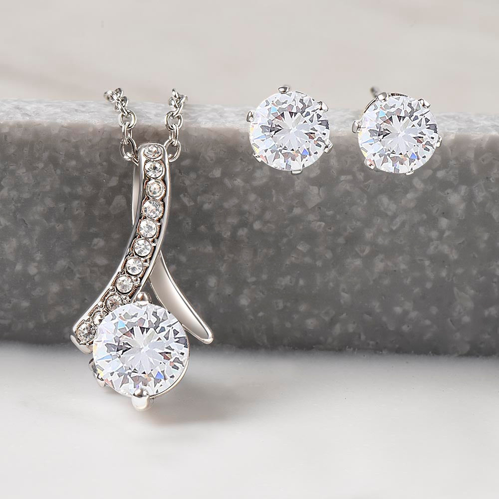 Alluring Beauty pendant and stud earrings on a white background | Alluring Beauty Necklace and Earring Set