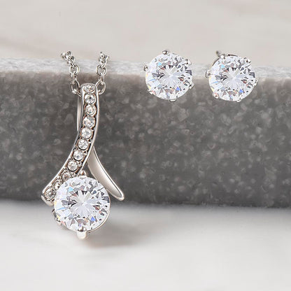 Alluring Beauty pendant and stud earrings on a white background | Alluring Beauty Necklace and Earring Set