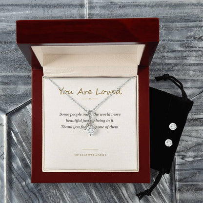 Alluring Beauty set in the mahogany Luxury Box on a grey surface | Alluring Beauty Necklace and Earring Set