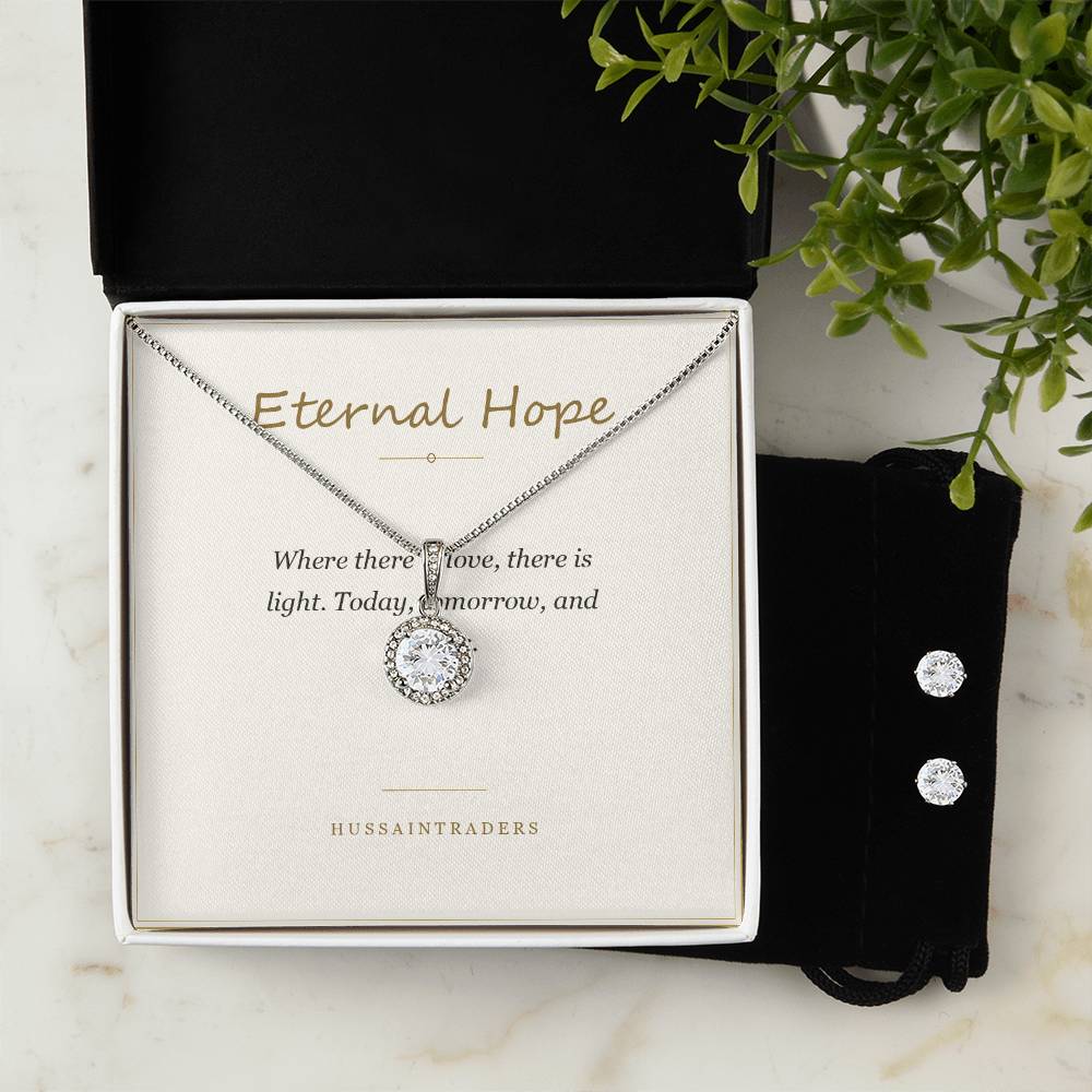 Eternal Hope set and card in a white box beside greenery | Eternal Hope Necklace and Earring Set