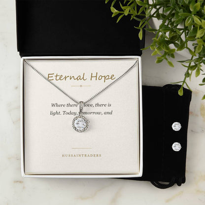 Eternal Hope set and card in a white box beside greenery | Eternal Hope Necklace and Earring Set