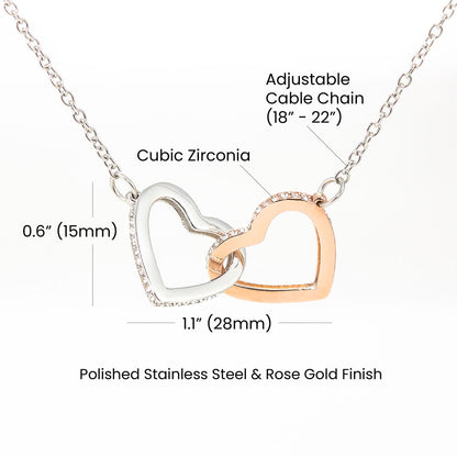 Size guide: hearts 0.6 by 1.1 inches on an adjustable 18 to 22 inch cable chain | Interlocking Hearts Necklace