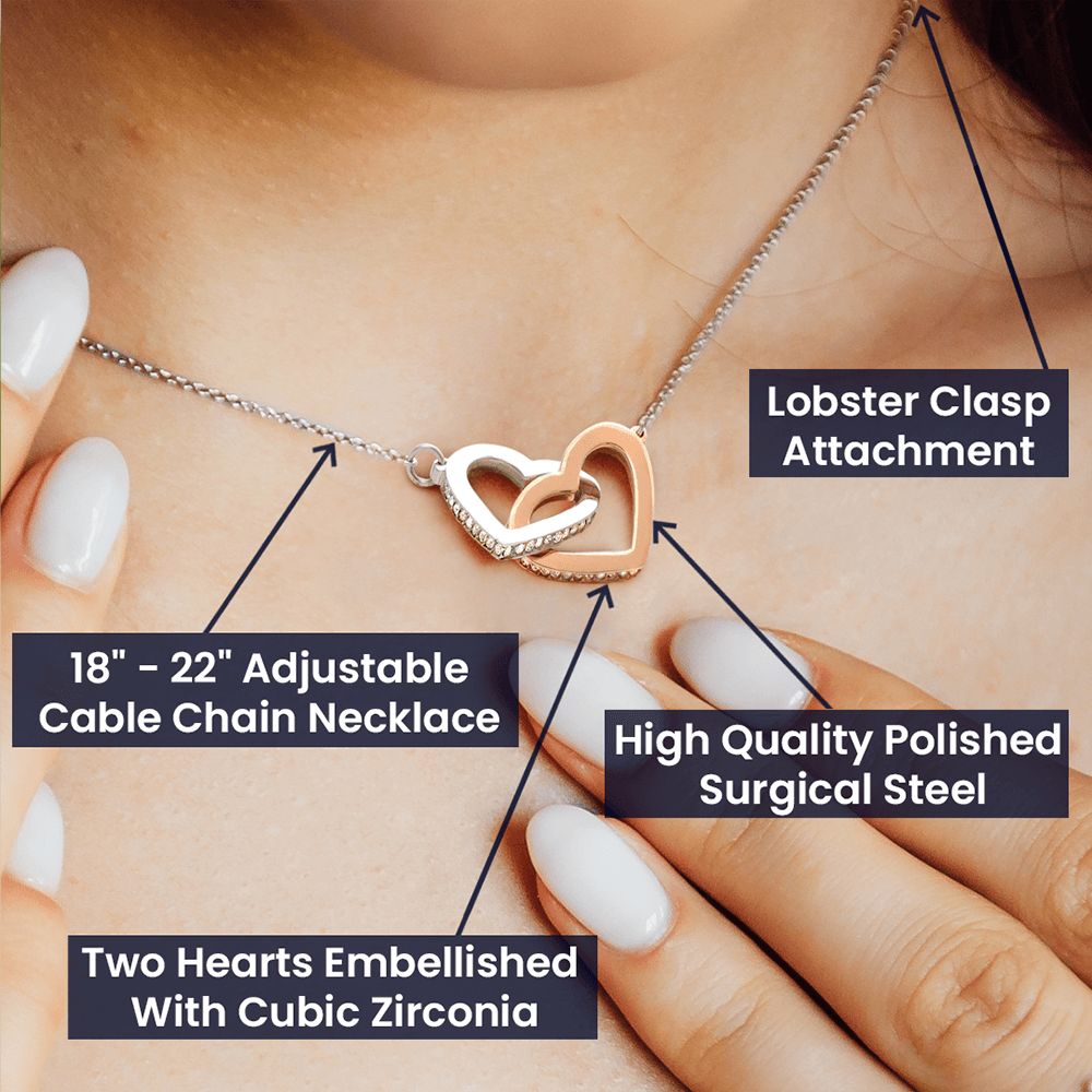 Labelled view: lobster clasp, adjustable chain and two hearts set with cubic zirconia | Interlocking Hearts Necklace