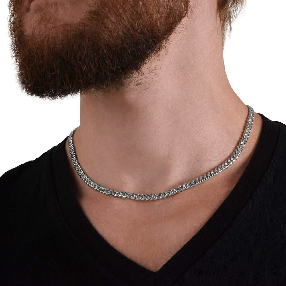 Man in a black tee wearing the steel Cuban chain, close view | Cuban Link Chain