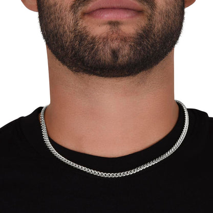 Steel Cuban chain worn with a black tee, front view | Cuban Link Chain