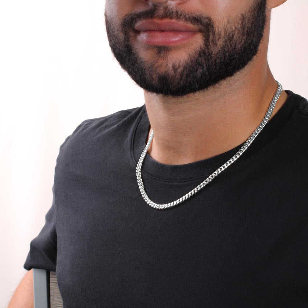 Man in a black tee wearing the steel Cuban chain | Cuban Link Chain