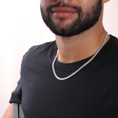 Man in a black tee wearing the steel Cuban chain | Cuban Link Chain