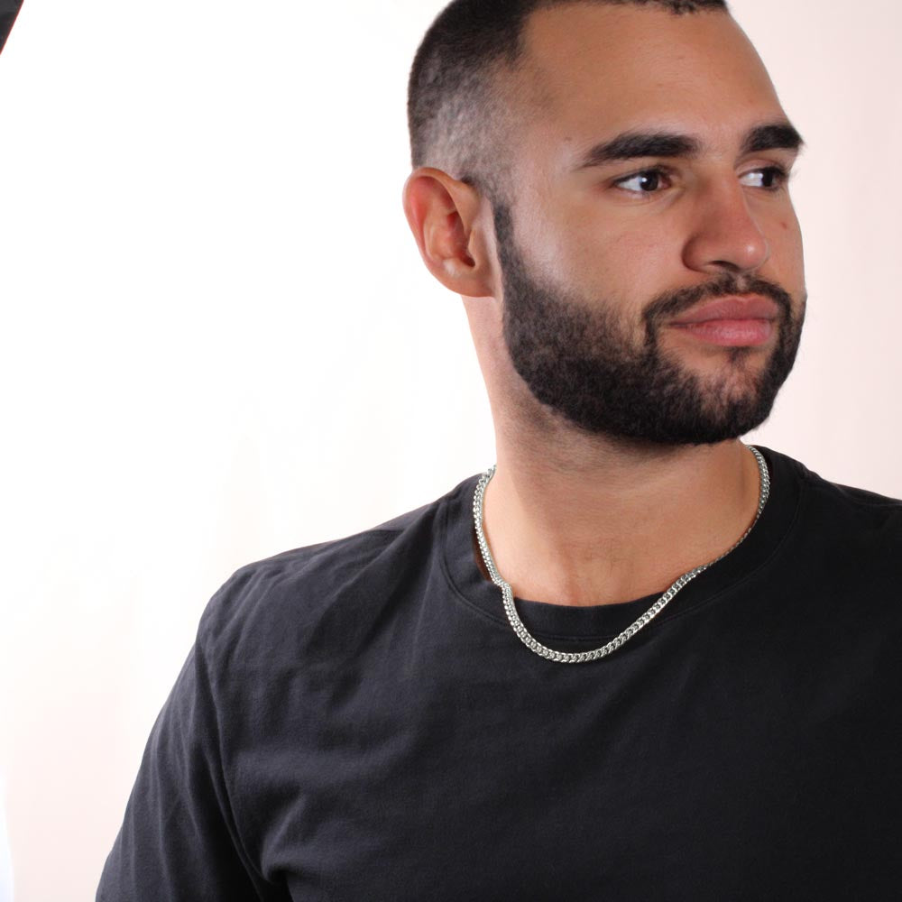 Man wearing the steel Cuban chain, angled view | Cuban Link Chain