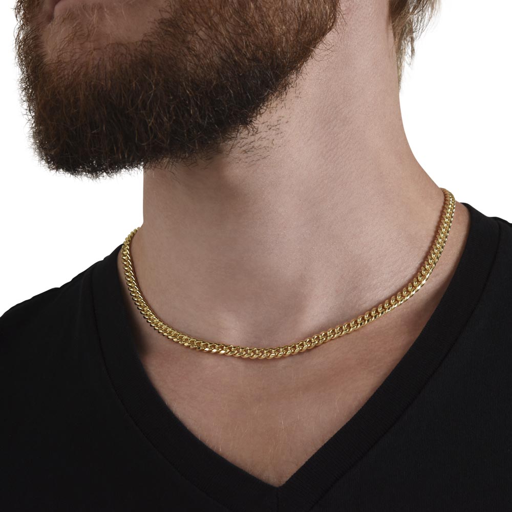 Gold finish Cuban chain worn with a black tee | Cuban Link Chain