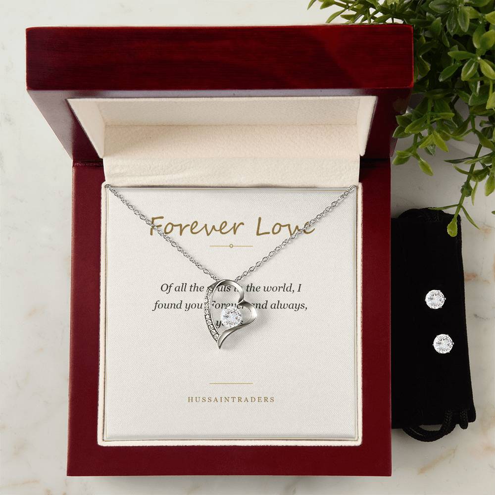 Forever Love set in the mahogany Luxury Box beside greenery | Forever Love Necklace and Earring Set