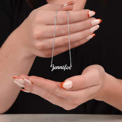 Silver name necklace held in both hands | Chosen Name Necklace