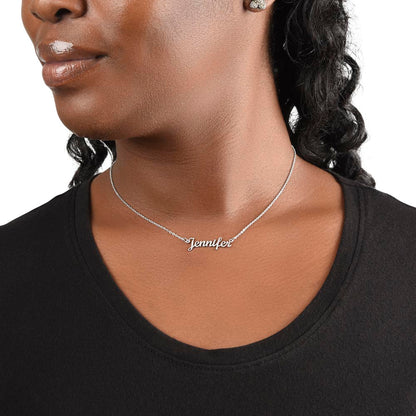 Silver name necklace worn with a black top | Chosen Name Necklace