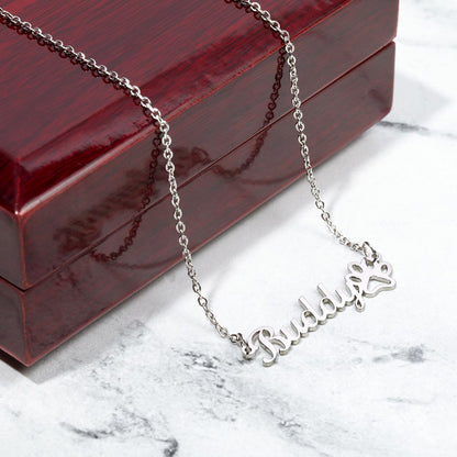 Steel paw print name necklace on a marble surface | Dog Mom Paw Print Name Necklace with Message Card