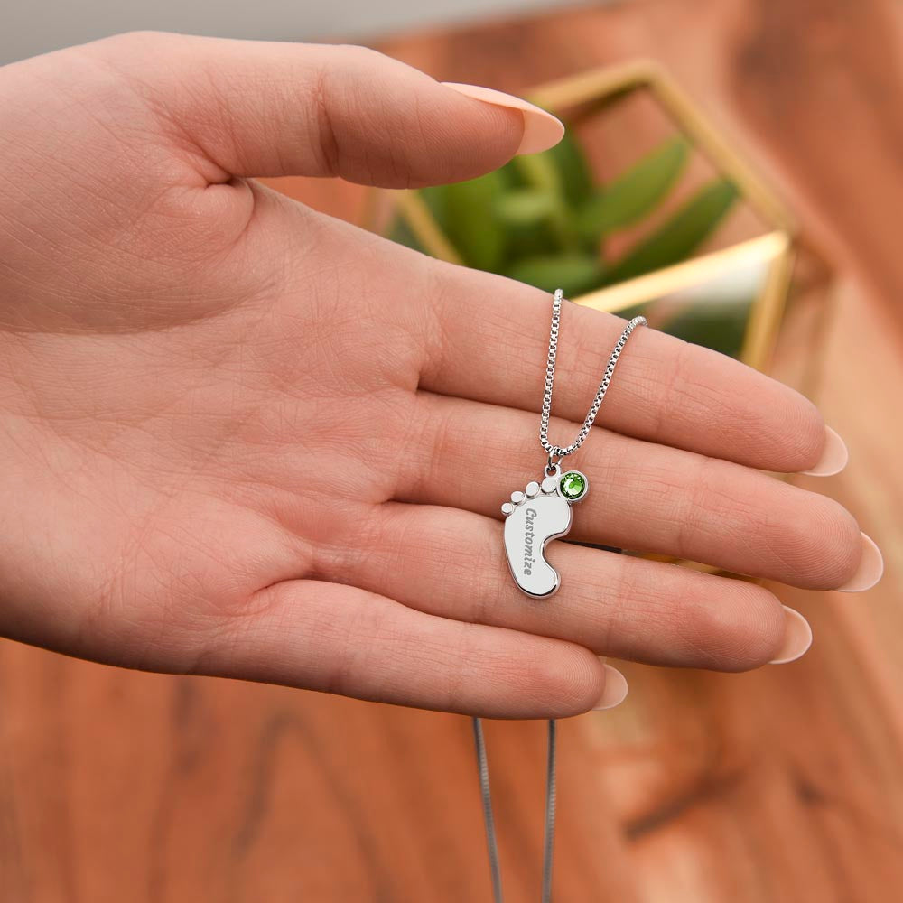 Silver baby feet charm in the palm | Baby Feet Birthstone Necklace