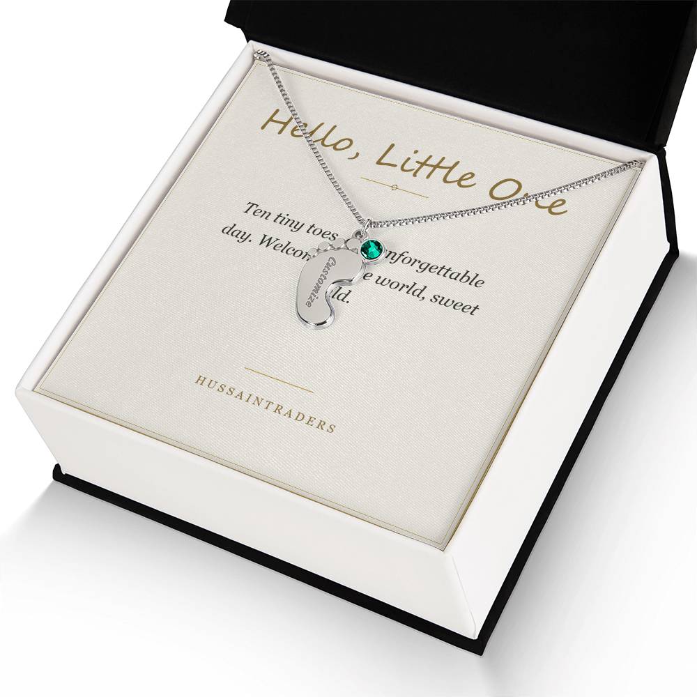 Silver charm and card in an open gift box | Baby Feet Birthstone Necklace