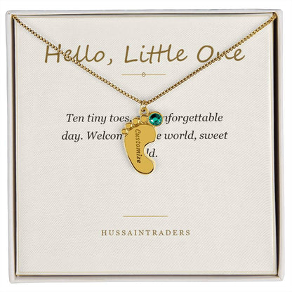 Gold finish baby feet charm on its Hello, Little One card | Baby Feet Birthstone Necklace