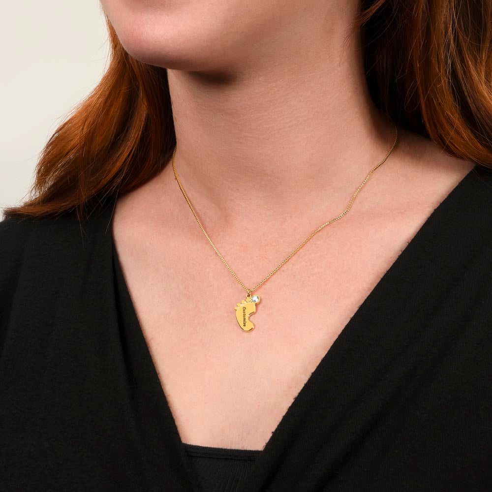 Gold finish baby feet necklace worn, side view | Baby Feet Birthstone Necklace